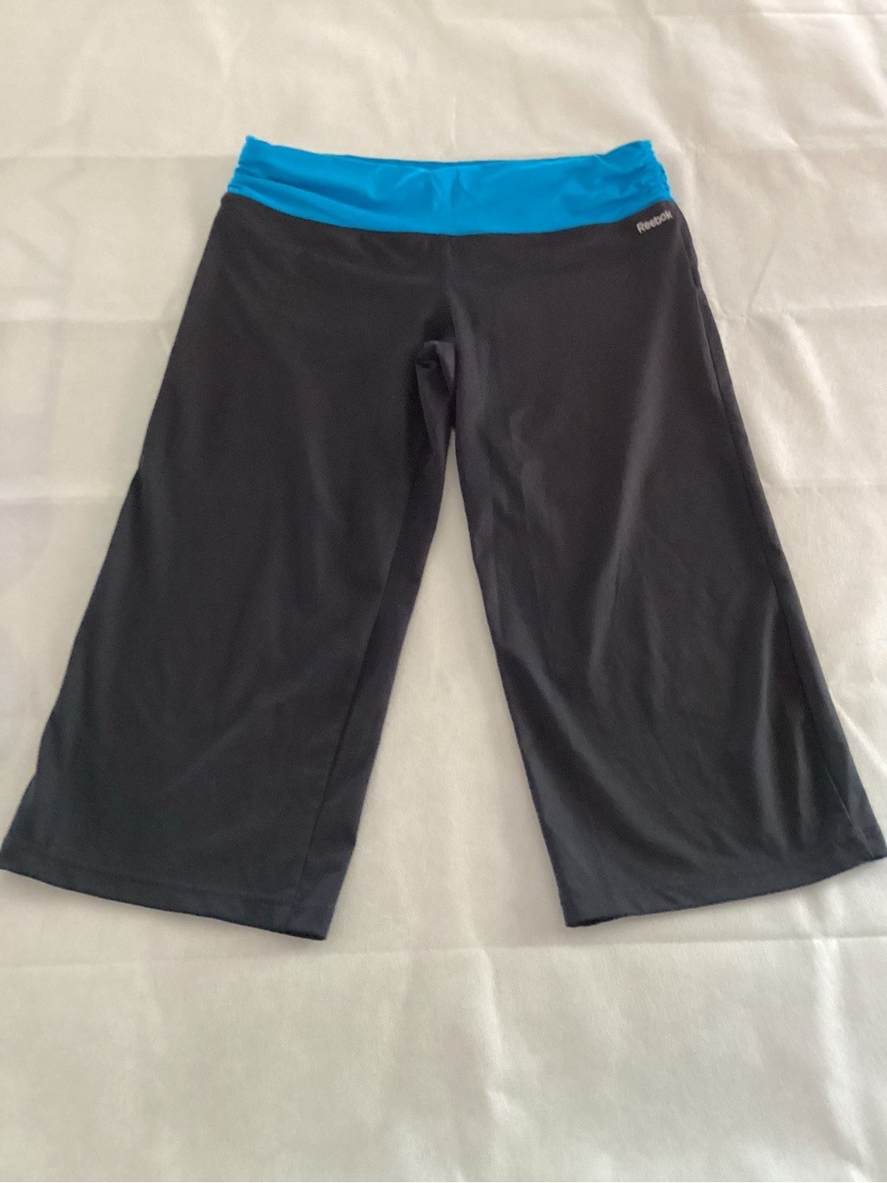 Reebok Black Leggings with Turquoise Waistband size large 6/1